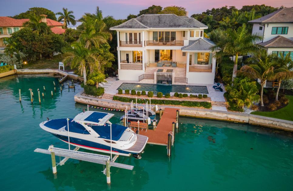 Stunning Lido Shores Residence with 80 Feet of Waterfront and Private Dock