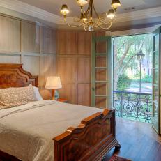Traditional Bedroom With Green French Doors