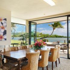 Tropical Dining Room With Flower Art