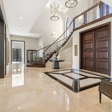Contemporary Foyer With Marble Floor