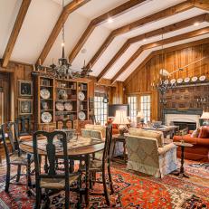 Rustic Great Room With Exposed Beams and Antique Furniture 