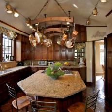 Traditional Kitchen Features Wood Cabinets and a Large Island 
