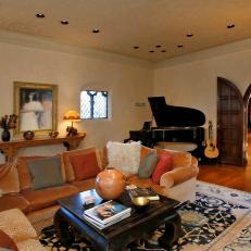 Traditional Living Room With Velvet Sectional and Grand Piano