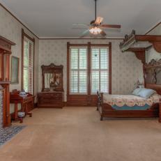 Victorian Bedroom With Blue Tile Fireplace
