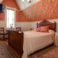 Orange Victorian Bedroom With TV