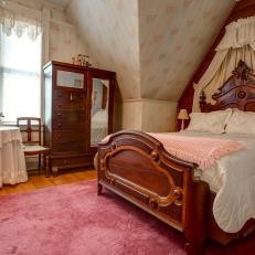 Victorian Bedroom With Antique Wood Bed