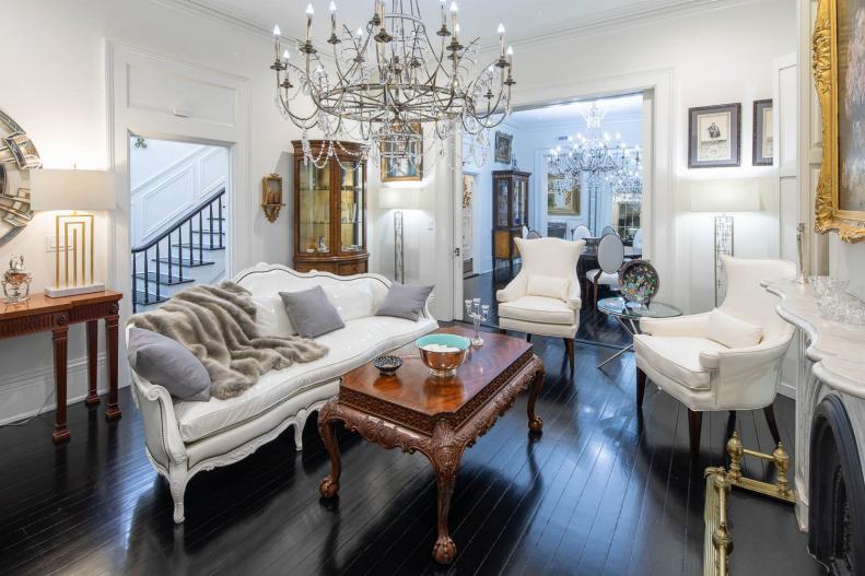 Sitting Room With Antique Lounge Furniture and a Chandelier