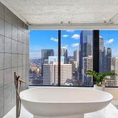 Modern Soaking Tub with Skyline Views