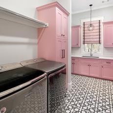 Pink Contemporary Laundry Room With Black Tile Floor