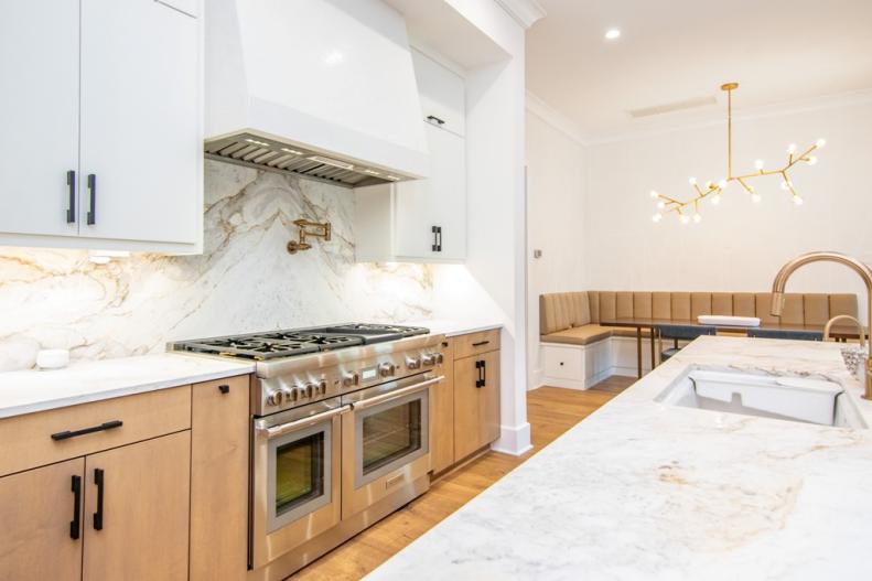 Marble Waterfall Edge Kitchen Island, Marble Backsplash, Gold Lights