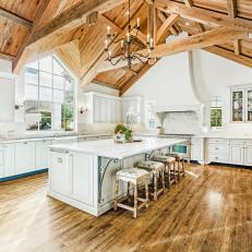 White Chef Kitchen With Vaulted Ceiling
