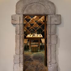 Old-World Doorway for Elegant Wine Cellar With Tasting Room