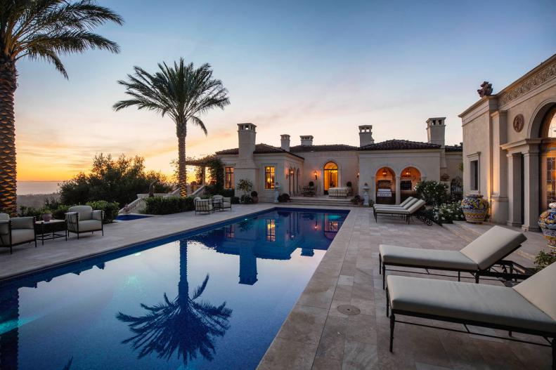 Mediterranean-Style Terrace with Lap Pool and Outdoor Fireplace