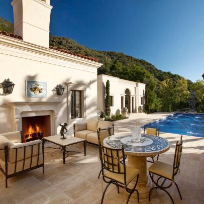 Poolside Outdoor Living Area With Fireplace