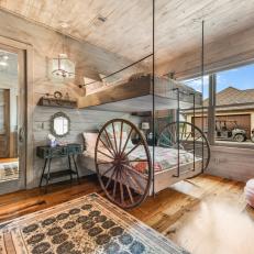 Rustic Bedroom With Wagon Wheel Bed