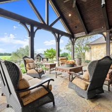 Rustic Pavilion With Gray Armchairs