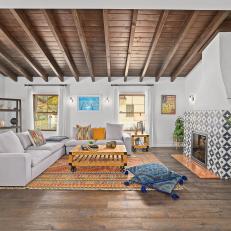 Mediterranean Living Room With Orange Rug