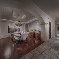 Gray Dining Room With Arched Doorway