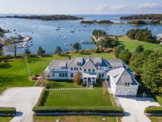 Aerial View of Waterfront Mansion, Boats on Water, Landscaped Yard