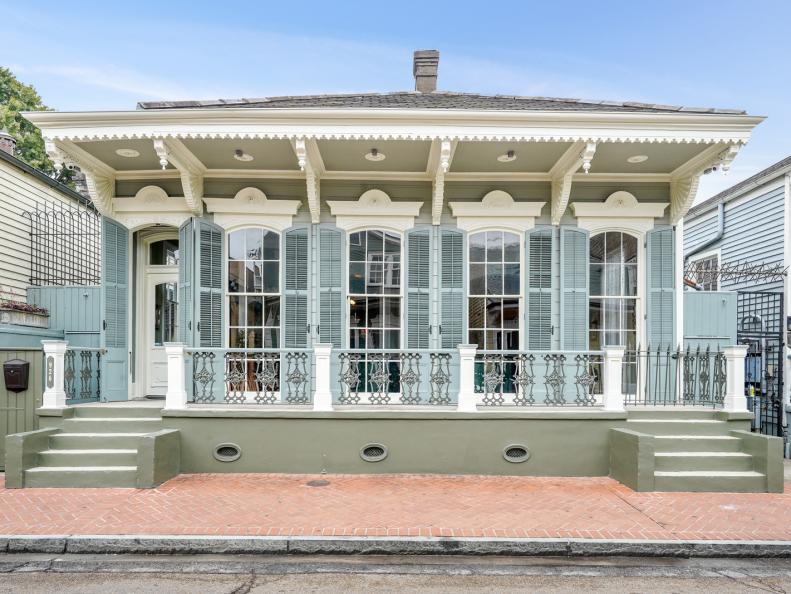 Blue Cottage Exterior With Shutters