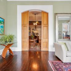 Green Living Room With Pocket Doors