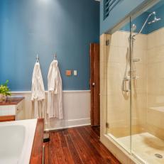 Blue Bathroom With Two Robes