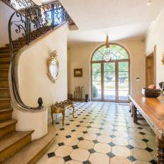 French Country Entry With Staircase