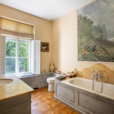 Guest Bathroom With Painting Above Tub