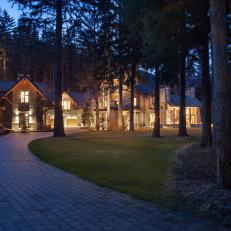 Driveway Leading To Illuminated Mountain Home