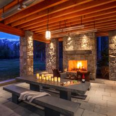 Covered Outdoor Dining Area With Fireplace