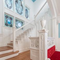 Staircase With Blue Stained Glass Windows
