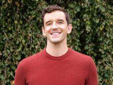Host Michael Urie on the lawn, as seen on Clipped.