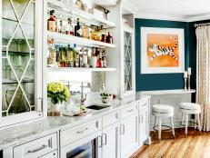 “Layer in the bling by upgrading hardware like drawer pulls and knobs and curtain rod finials. I love hardware, it's like the jewelry of the room - that final touch that can add a little glamour. It makes all the difference in transforming the look!”  
Marlaina Teich of New York-based Marlaina Teich Designs 

