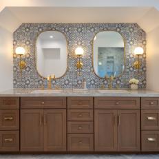 Vibrant Blue Patterned Accent Wall With Chocolate Brown Cabinetry