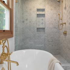 Patterned Gray Tiled Shower With Shiny Golden Accent Colors 
