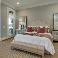 Transitional Bedroom With Red Pillows
