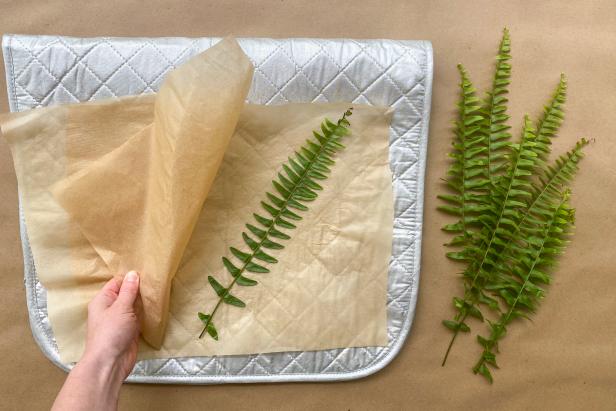 In between ironing, check each fern sprig to ensure they are pressing firmly and not burning. Each sprig should need about 10 seconds of direct heat from the iron.