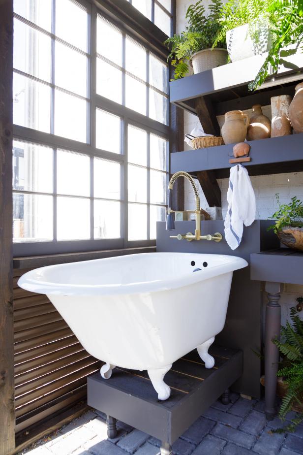 Bathtub Used as a Sink in a Greenhouse Made From Upcycled Windows HGTV