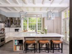 White Chef Kitchen With Brown Stools