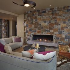 Living Room With Stone Fireplace as Focal Point