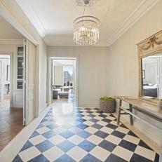 Welcoming Entryway With Black and White Checkered Floor