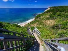 Clear blue ocean and stairs down to Mohegan Bluffs of Block Island, RI