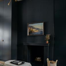 Black Fireplace and Gray Stool