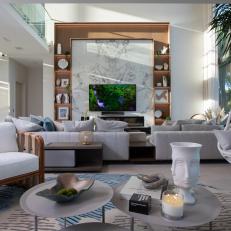 Neutral Tropical Living Room With Hanging Chair