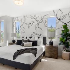 Transitional Black and White Bedroom With Striking Floral Accent Wall