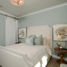 Paneled Blue Bedroom With Gorgeous Multi-Colored Crystal Paintings