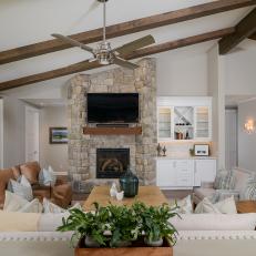 Stunning Vanilla Brown Brick Fireplace With Dark Wood Paneled Ceiling
