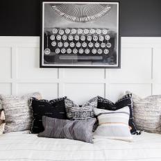 Black and White Bedroom With Vintage Typewriter Painting