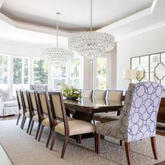 Wide Mid-Century Modern Dining Room With Two Stunning Diamond Chandeliers