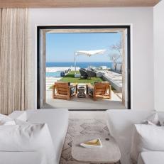 White Chaises and Patio View
